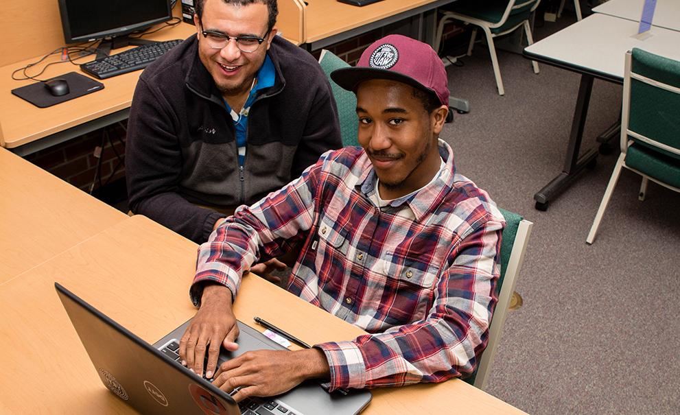 student working on computer